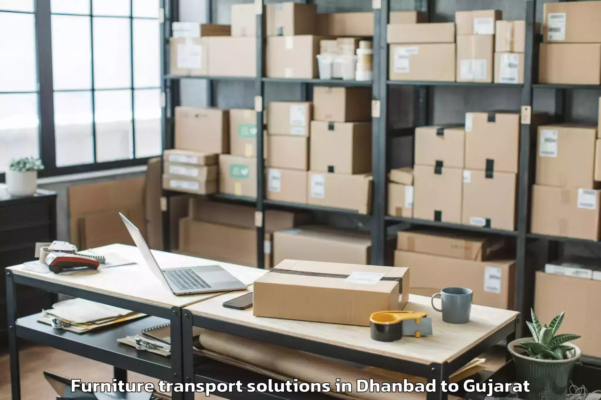 Book Dhanbad to Nadiad Furniture Transport Solutions